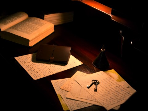 keys and notes on a desk