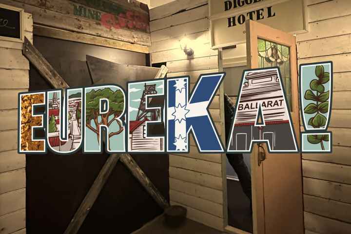 Interior with rustic wooden decor and large 'EUREKA!' text overlay.