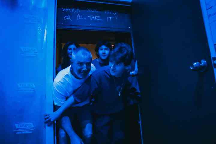 A group of people entering a room