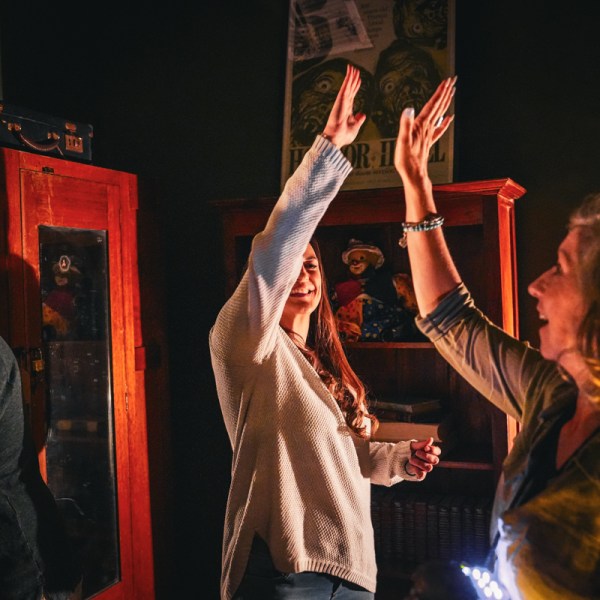 Two women high fiving in celebration
